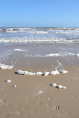 Sea foam on a beach in Texas