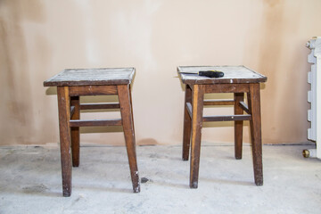 Two stools at the room. Repair work in the apartment. Concept of home improvement or renovate....