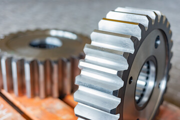 Big gear after milling on a gear cutting machine, finished goods warehouse of machine-building production.