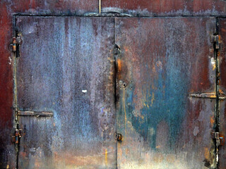 Metal garage doors painted like abstract paintings