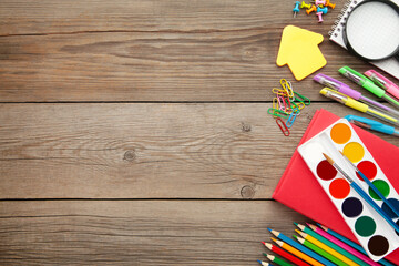 Obraz premium Back to school concept on grey wooden background. Top view
