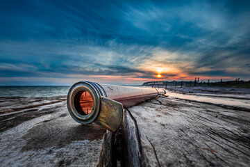old binoculars on the beach