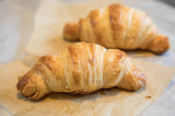 fresh croissant on a wooden table