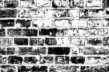 Obraz premium Texture of a brick wall with cracks and scratches which can be used as a background