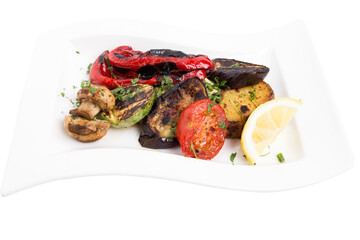 Set of grilled vegetables on a white plate.