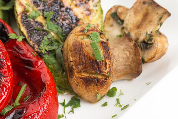 A fragment of a dish of vegetables on the grill.