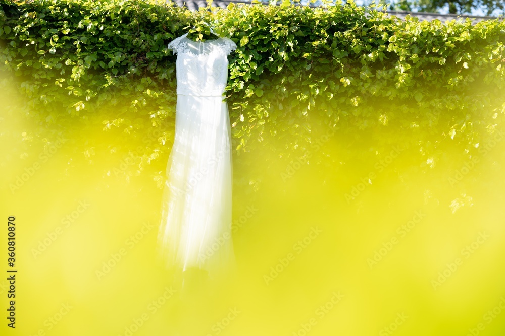 Sticker Landscape shot of a beautiful white wedding dress