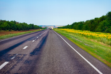 Federal highway, autobahn with cars and summer landscape