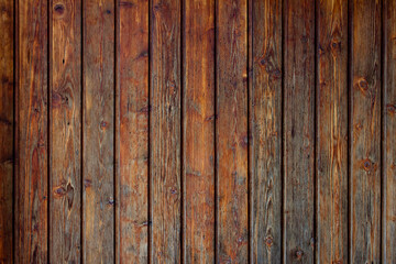 Brown wood pallets or planks wall varied vertical texture for background