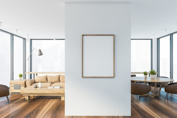 Living room and dining room with poster