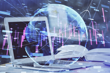 Fototapeta na wymiar Forex graph hologram on table with computer background. Double exposure. Concept of financial markets.