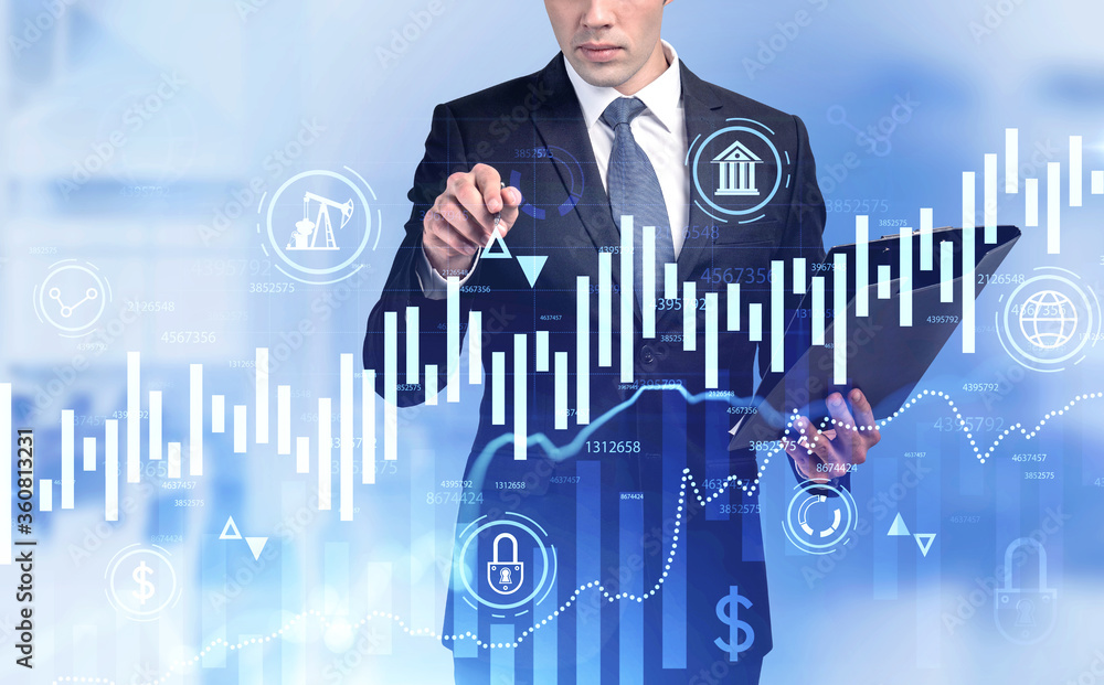 Aufkleber man working with digital chart in office