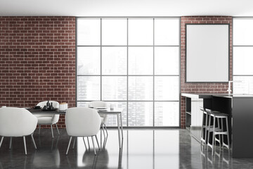 Brick kitchen with table, bar and poster