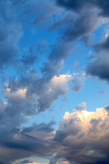 Naklejka na ściany i meble Colorful dramatic sky with cloud at sunset.