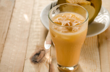 Thai tea with milk in a glass.