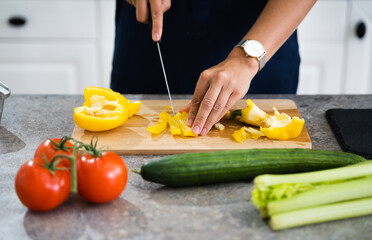 Woman Cooking Dinner At Home