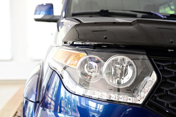 Photo of a car headlight. Lamp close-up © Вячеслав Чичаев