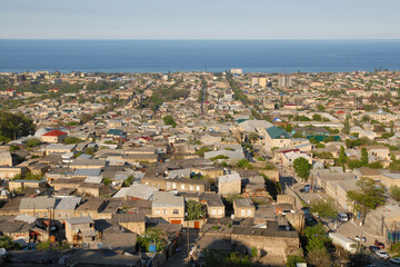 Fototapeta na wymiar Cityscape. View at Derbent town and Caspian Sea. Dagestan, North Caucasus, Russia.