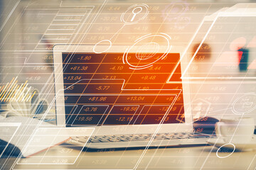 Double exposure of desktop computer and technology theme hologram. Concept of software development.