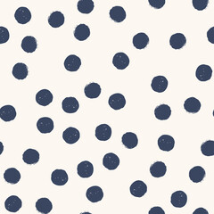 Dark blue polka dot seamless pattern on light beige background. Vector design for textile, backgrounds, clothes, wrapping paper, web sites and wallpaper. Fashion illustration seamless pattern.