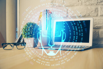 Multi exposure of work space with computer and human brain hologram. Brainstorm concept.