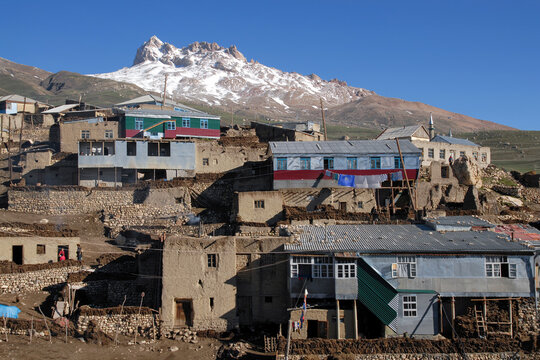 Kurush village (the southernmost point of Russia and the highest mountain settlement in Europe, 2560 m) and Shalbuzdag mountain (sacral peak of Dagestan people). Dagestan, North Caucasus, Russia.