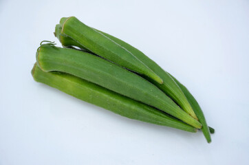 the ripe green ladyfinger isolated on white background.