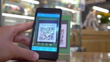 Smartphone scanning the recipient’s QR code. Mobile banking. Customers can pay through QR code, bank card, bank account or e-wallet by using payment gate