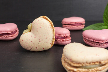 heart shaped macaroons  in pink and pale yellow with mint
