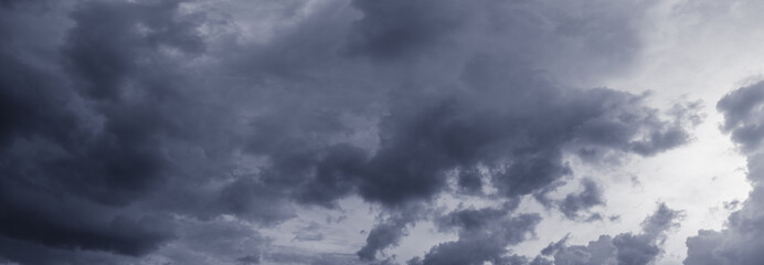 Obraz premium Panorama of dark stormy sky, background for design