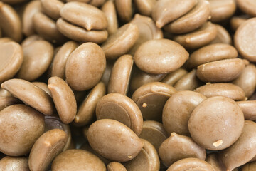 heap of sweet milk chocolate drops