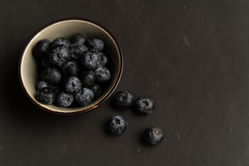 Blueberry antioxidant organic superfood in ceramic bowl concept for healthy eating and nutrition