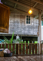 Terrace of a wooden house in the midst of nature