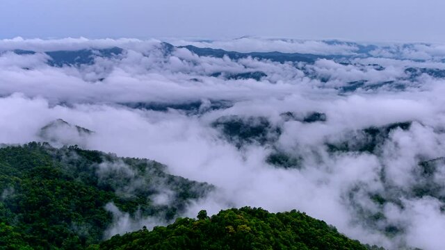 Time lapse video 4K, Morning mist over the mountain above Doi Pha sam Liam, Mae tang, Chiang mai, Thailand.