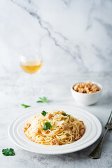 Ground chicken or turkey pasta in a white plate