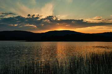 Sunset in Kragerø, Norway. Sørlandet. Beautiful warm colors with water and mountains. 