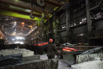 Steelworker at work at a steel mill