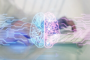 Man with computer background with brain theme hologram. Concept of brainstorm. Double exposure.