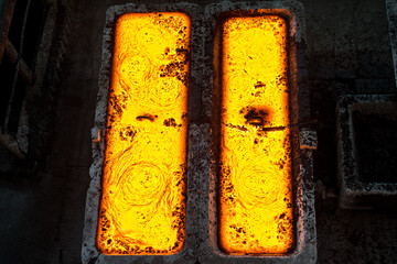 Molten metal cast into the molds at the steel mill