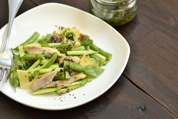 Chicken salad with zucchini, green beans and basil pesto,  copy space