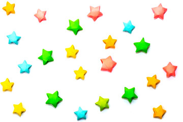 Seamless background in a children's style from multi-colored paper stars. For printing on fabric, covers, booklets and entertainment products.