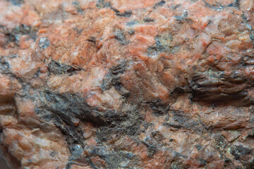Blurred when heavily magnified, with a fine granite texture. Soft colors and fine details of the texture are not visible to the naked eye.