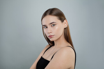Fototapeta premium Beautiful female face without makeup. Skincare and facial treatment concept