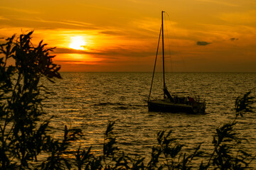 Sail on the sunset in peace and tranquility.