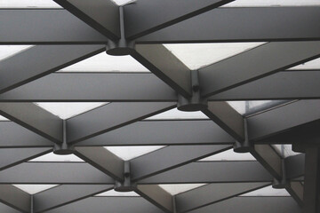 Black and white-gray abstract image of the ceiling of a building. Architecture. Abstraction, background, texture, substrate.
