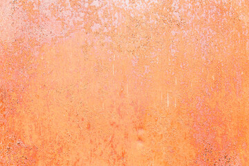 Rusty surface of a pink sheet of iron. Background. Space for text.