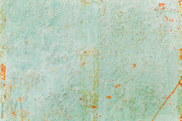 Rusty surface of a turquoise sheet of iron. Background. Space for text.