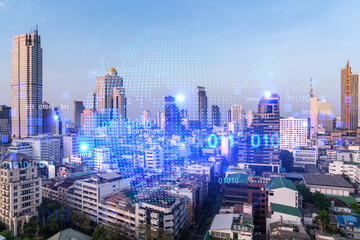 World planet Earth map hologram over panorama city view of Bangkok, Asia. The concept of international connections and business. Multi Exposure.
