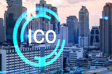 Hologram of glowing ICO icon, sunset panoramic city view of Bangkok, startup incubator of cryptocurrency projects in Asia. The concept of affordable opportunities in new era. Double exposure.
