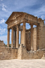 The remains and ruins of the Roman city of Dougga with the Capitol in Tunisia. 